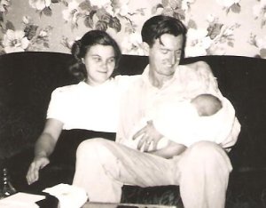 Dad holding me as a baby